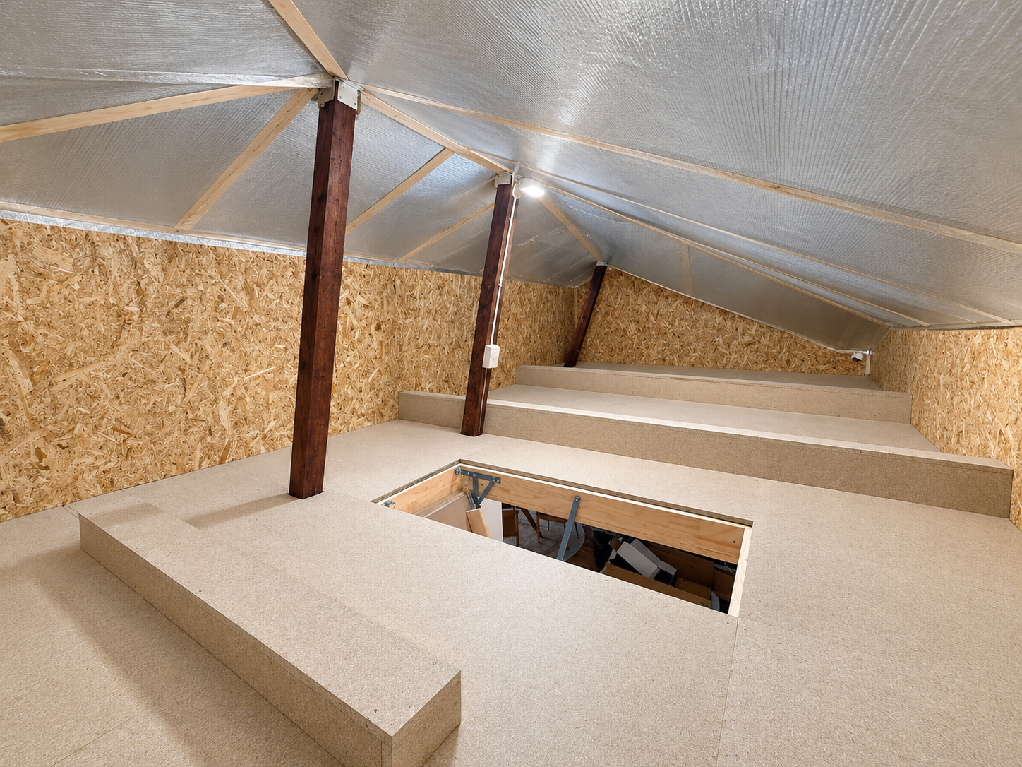 Finished attic storage area with lined roof space